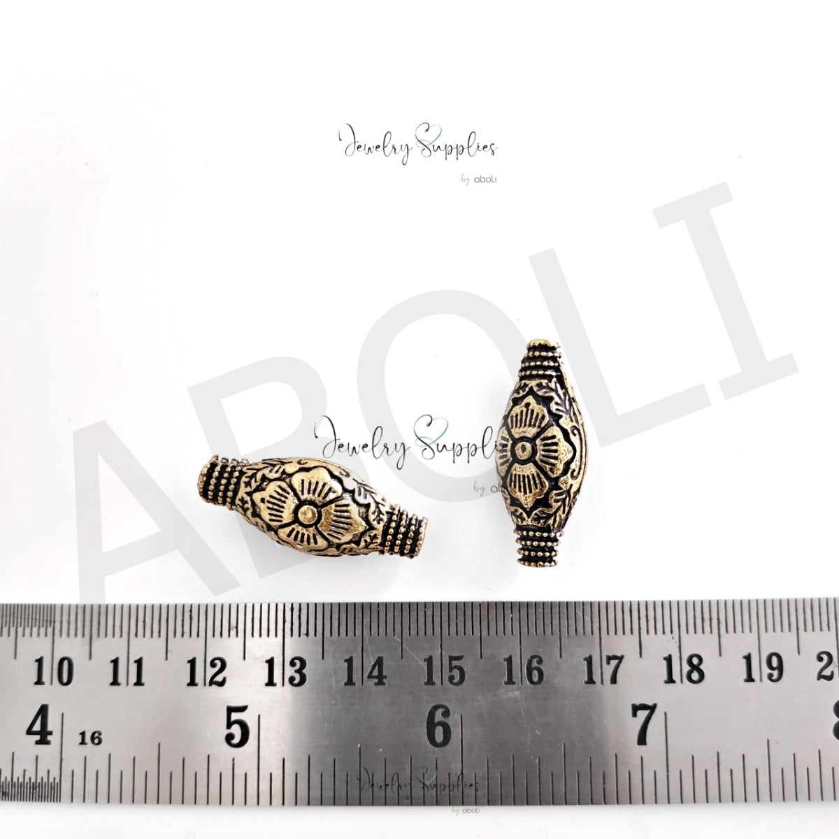 Golden Brass beads 29 x 12 mm spindle shaped premium raw brass Tibetan bead FBBS23 1 bead