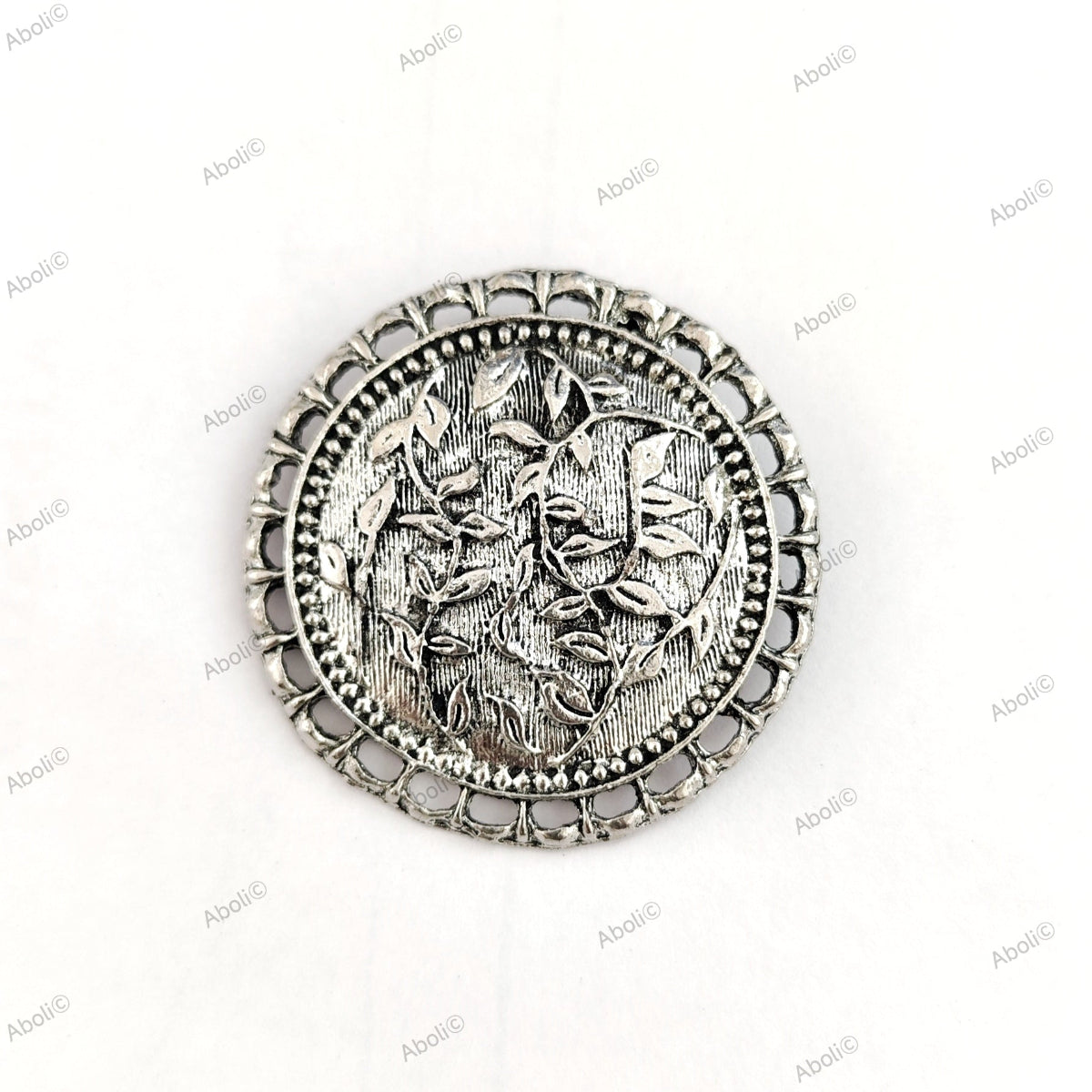 German silver circle pendant with leaves motif SP250