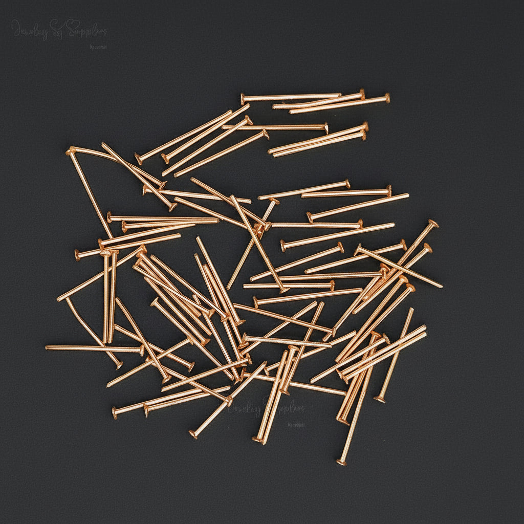 rose Gold jewelry pins scattered on a white backgroun