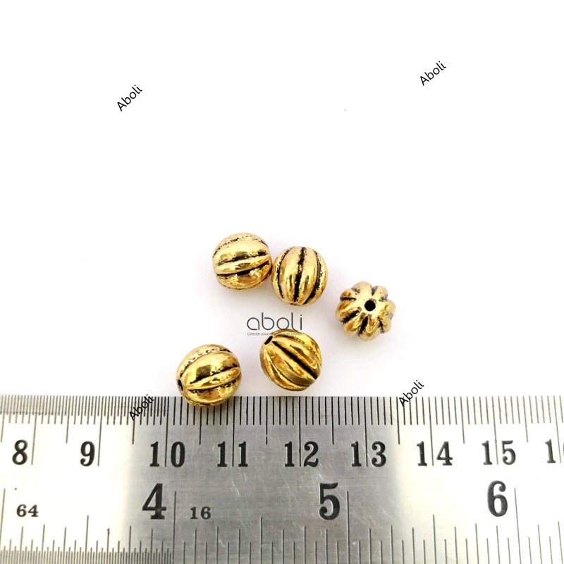 Designer golden pumpkin spacer beads DSB39