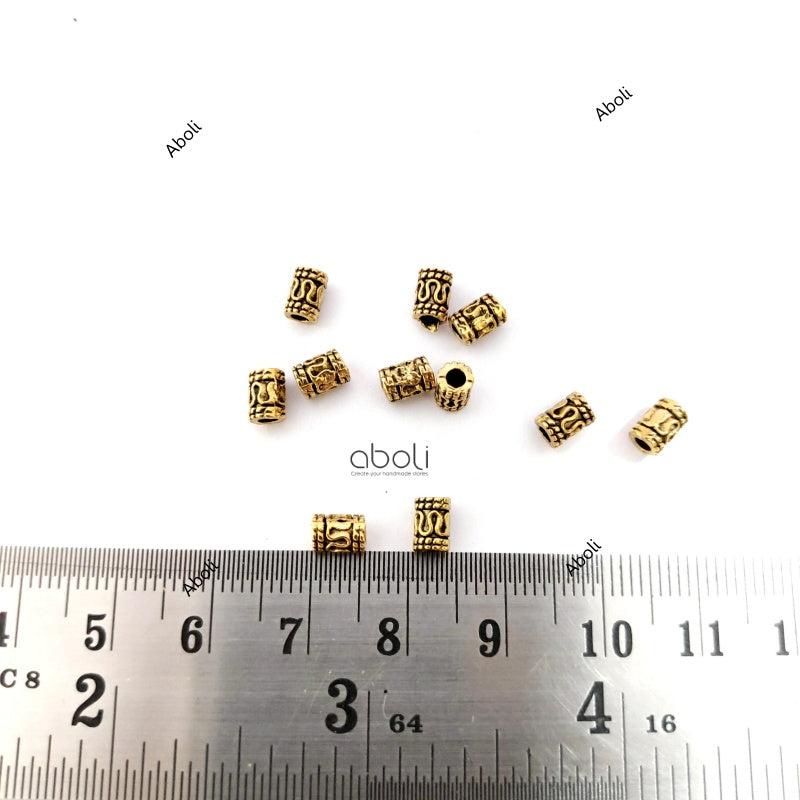 Designer golden cylinder spacer beads DSB40