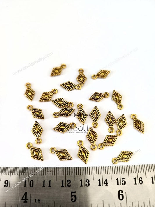 Golden kite shaped rhombus shape Charm dangles CHMG135 10 gm