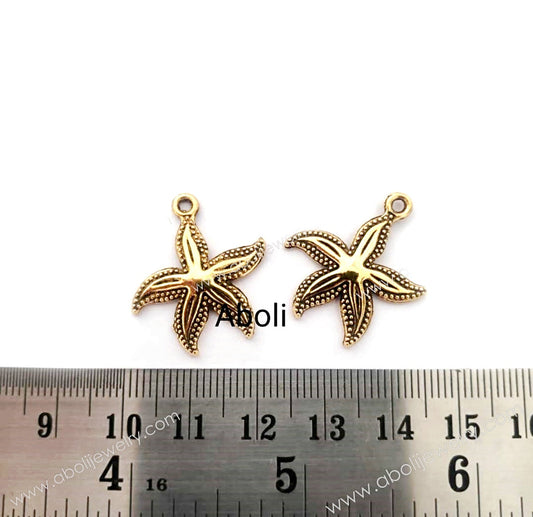 Golden starfish Charm sea creatures, ocean, nautical, summer, animal, fish theme charm CHMG63 2 charms