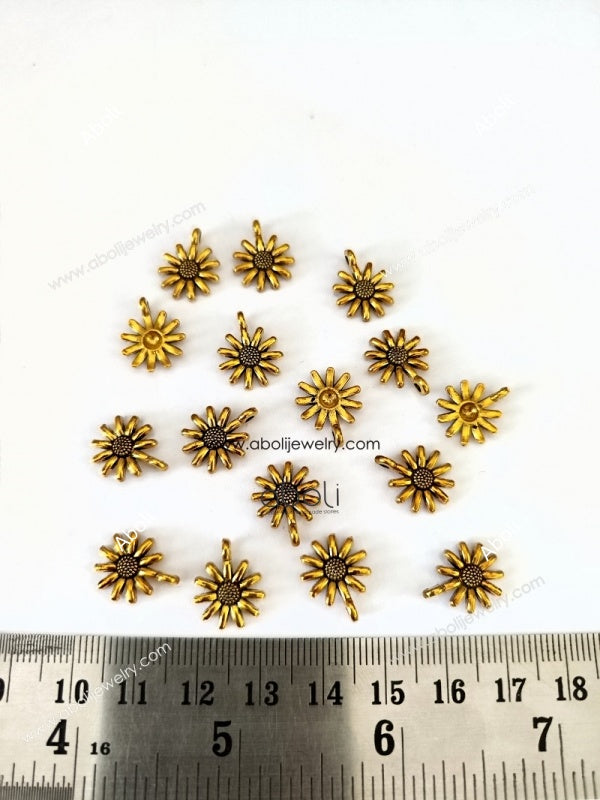 Golden flower Charms CHMG127 10 gm