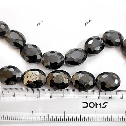 Black flat oval Faceted crystal glass bead 20 x 15 x 9 mm with silver foil finish FGB99