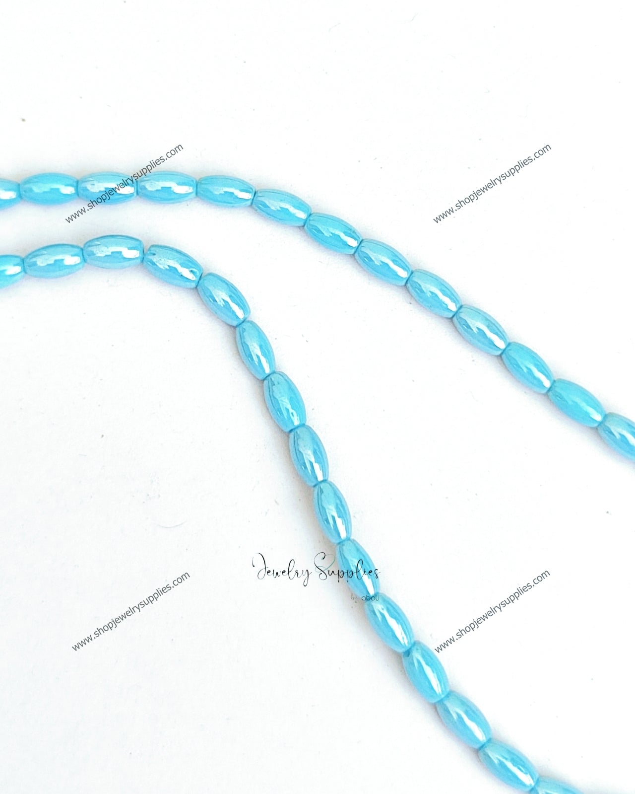 Blue glass beads oval 8 x 4 mm pearl luster OGB04 1 full strand