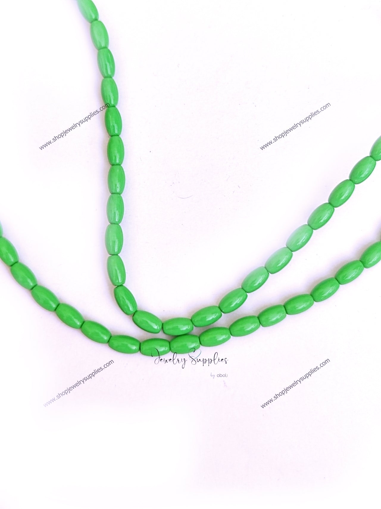 Green glass beads oval 8 x 4 mm OGB02 1 full strand