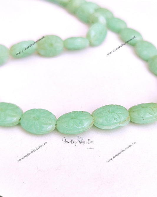 Carved oval beads synthetic glass beads mint colour 14 x 11 x 6 mm GBD211 10 beads