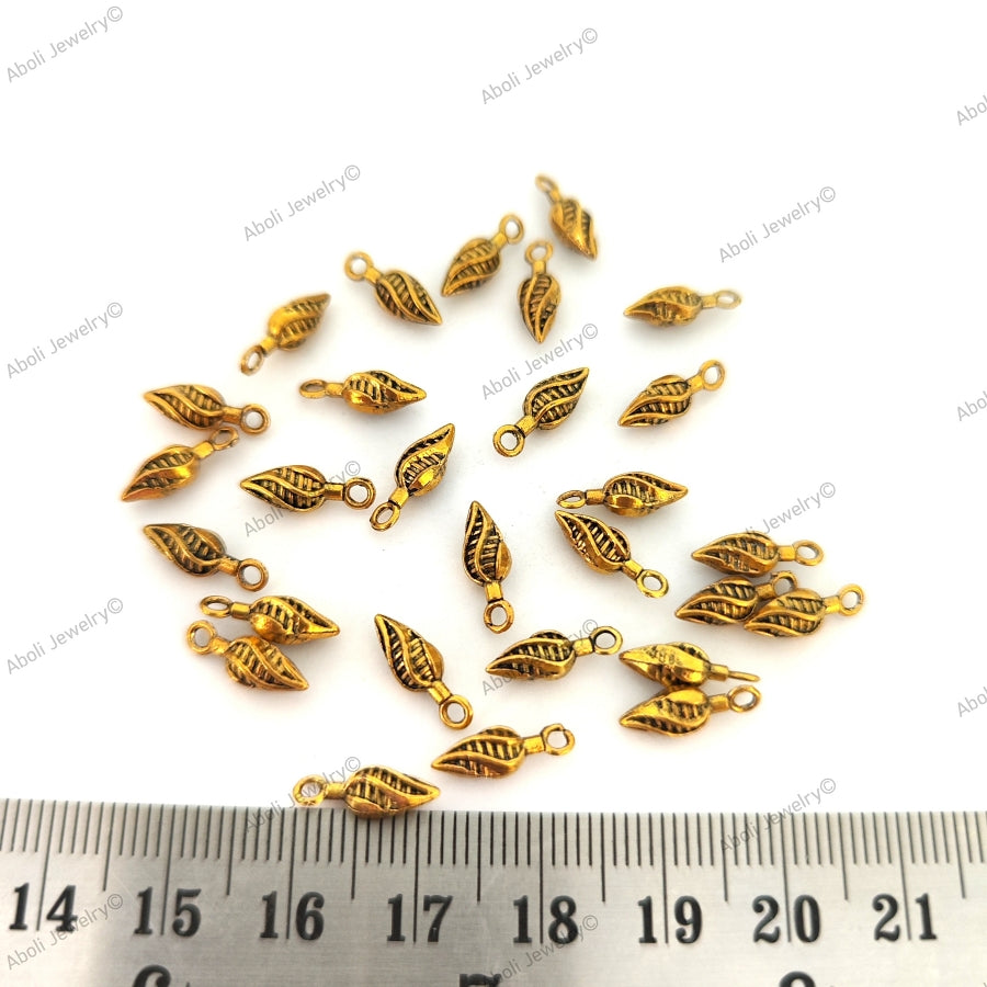 Antique golden twisted leaf metal dangles jhumki 12 x 4 mm dangle charms latkan metal beads GSDB05 10 gm