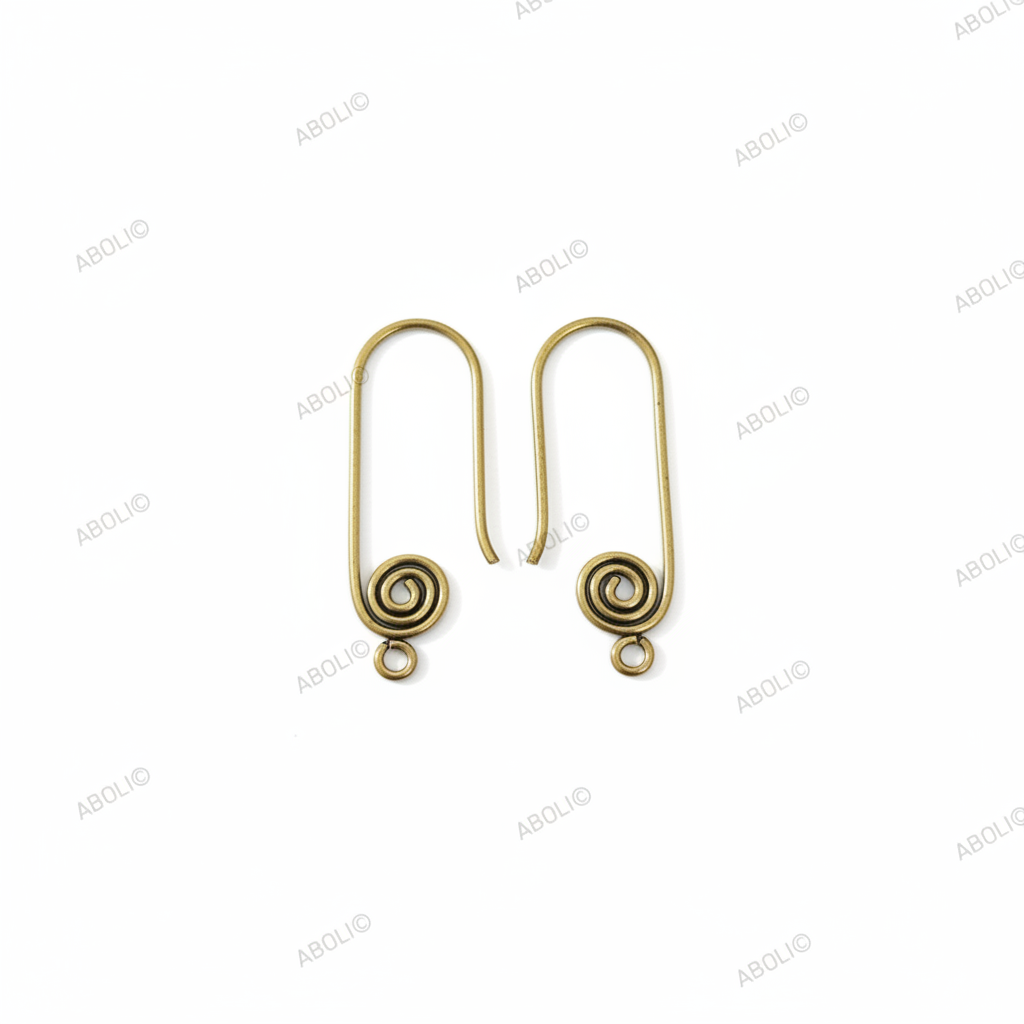 Pair of gold spiral earrings on a white background