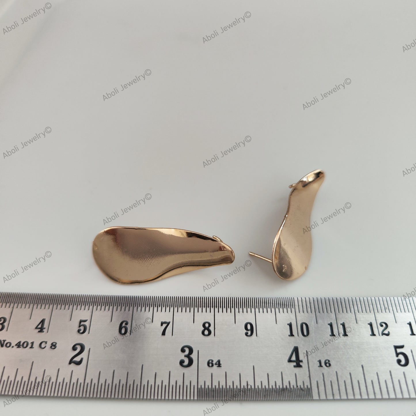 Wavy tapered oval golden stud component contemporary modern geometric studs MESCNRC19