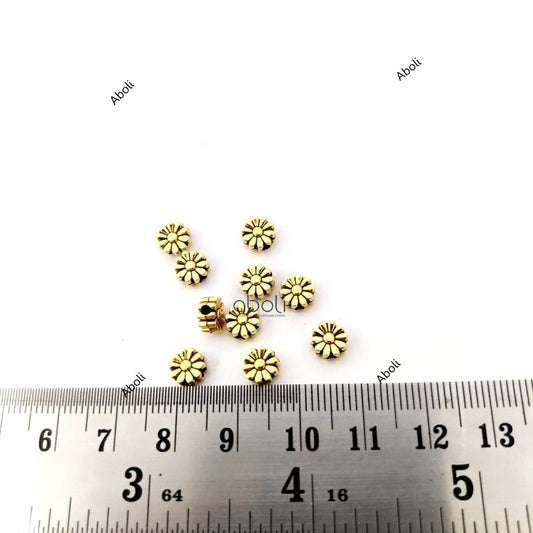 Designer golden flowers spacer beads DSB41