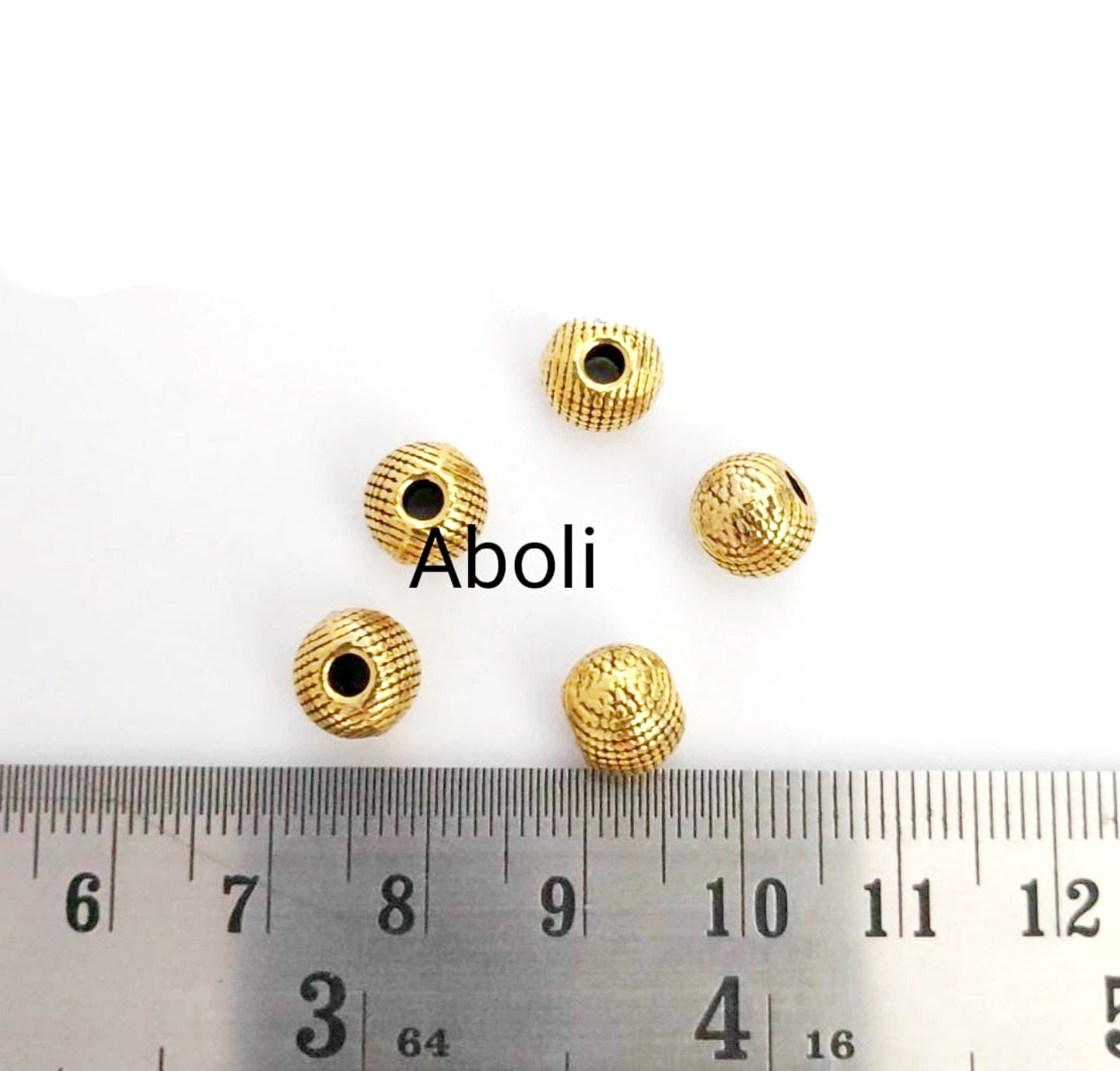 Designer round golden spacer beads DSB25