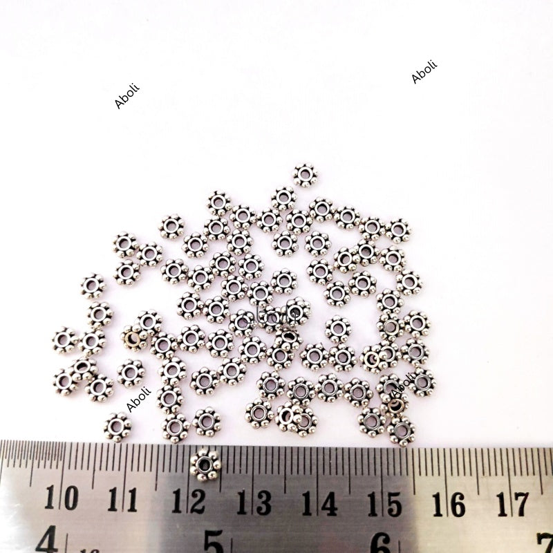 Designer silver daisy floral spacer beads DSB52