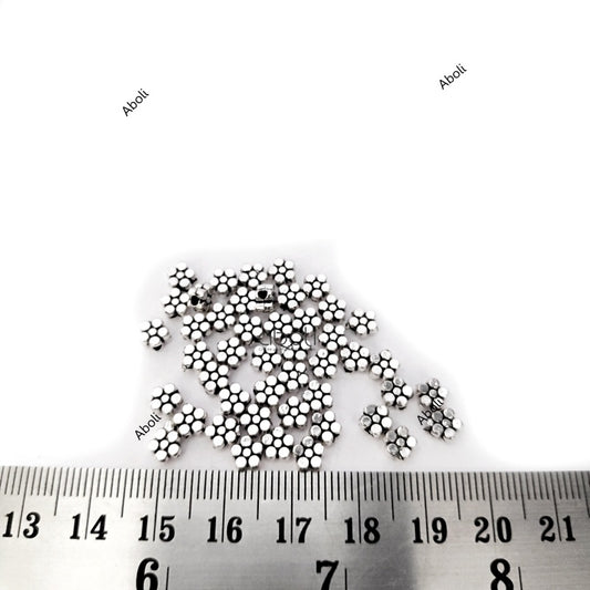 German silver flower spacer beads DSB53 10 gm