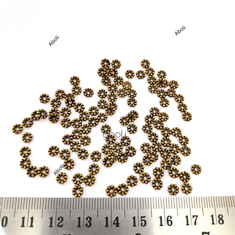 Designer antique bronze daisy spacer beads DSB62 10 gm