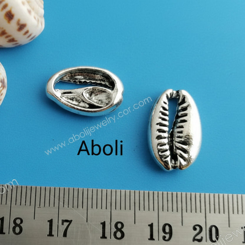 Silver shell charm kowdi kowrie charm anchor ocean sea ship nautical theme CHMS40 1 charm