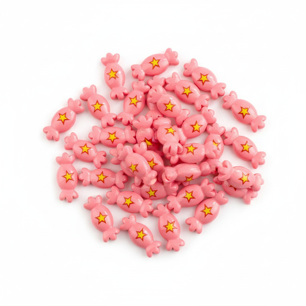 Pink candies cabochon with yellow stars on a white background
