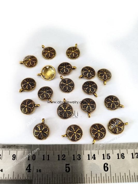 Golden round floral Charm CHMG128 10 gm